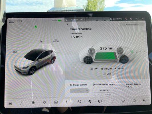 Tesla Screen. Car will be fully charged in another 15 minutes. 45 minutes Total. Less than $17 and I will have 300 miles.