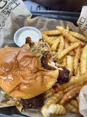 Hot chicken sandwich with slaw and fries