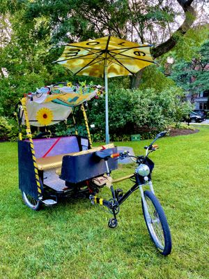 5 seat semi-motorized pedicab complete with sound system and shade!