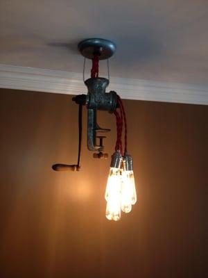 Light fixture made from a vintage meat grinder!