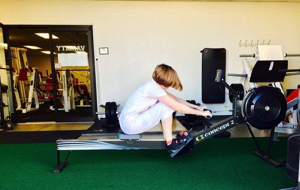 Rowing with the garage door open helps everyone stay motivated and rest!