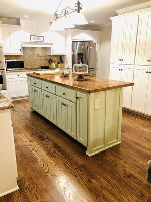 Red oak with provincial stain in kitchen.