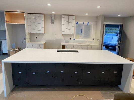 Pure white miter waterfall custom quartz countertop