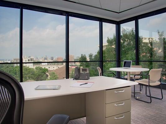 Corner office with views of Downtown and Vanderbilt