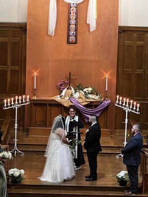 Our senior pastor conducting a beautiful Scottish-Mexican wedding between these two lovely individuals!