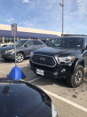 Two spots, veterans only sign clearly posted