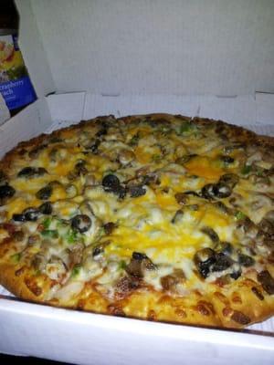 Deluxe pizza with Italian sausage & cheddar!