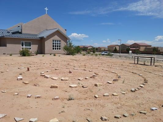 A view of the church when the labyrinth was first being made.  We began with a spiral so that it would be easier to create it.