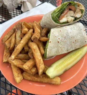 Chicken Caprese Wrap Grilled chicken breast, fresh mozzarella, tomatoes, spring mix and balsamic glaze in a wrap served with a side of fries