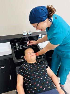 We love working with children! During the treatment we use gentle washing and brushing techniques to put your child at ease.