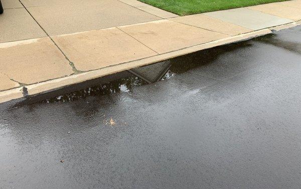 Another driveway with water pooling since Hutch's paving job in August 2021.