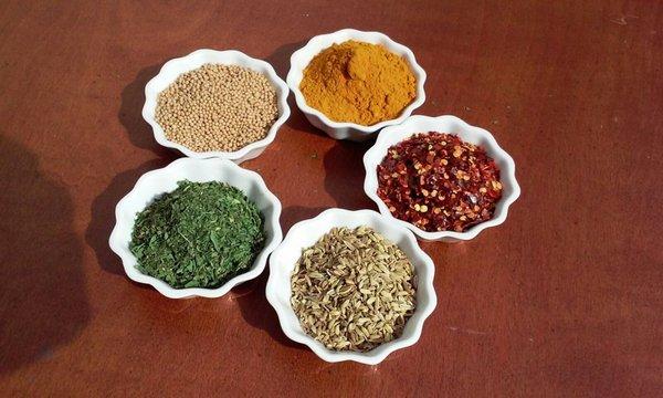 Turmeric (Top), Chili Flakes (Right), Fennel Seeds (Bottom right), Parsley (bottom left), and Mustard Seed (left)