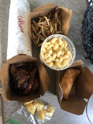 Side of brisket, buckoff egg roll, fries, Mac n cheese & cattleman sandwhich