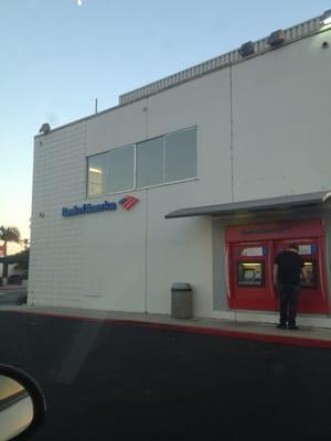 Two ATMs facing the parking lot