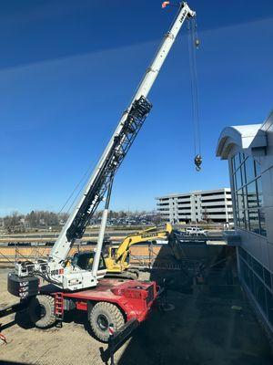 CDA Crane helping us place 2 new roof top units!