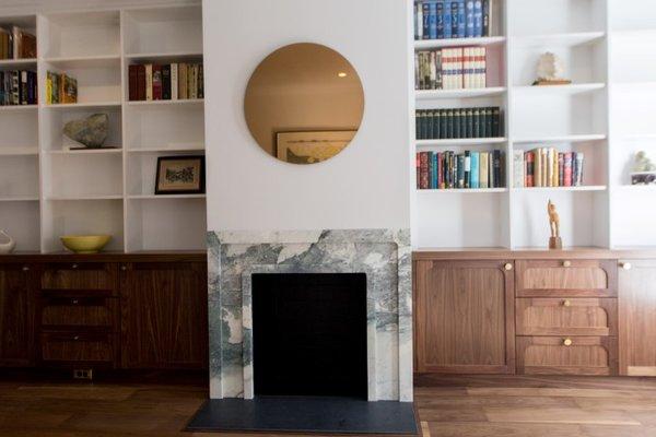 New walnut flooring was installed in the living room by Eclectic Builders.