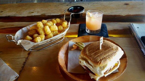 Bunaburger, tater tots, and a greyhound.