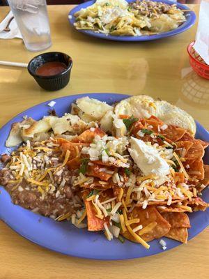 Red chilaquiles with eggs ,beans and yummiest potatoes!A