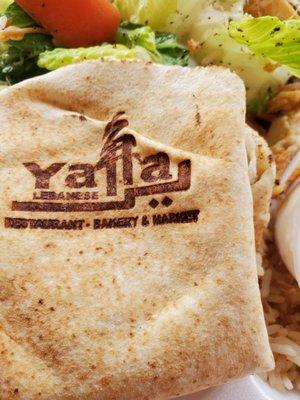 Yalla Lebanese Bakery.  This shows the market's "branded" pita bread included in the Shawarma platter.  Garlic sauce.