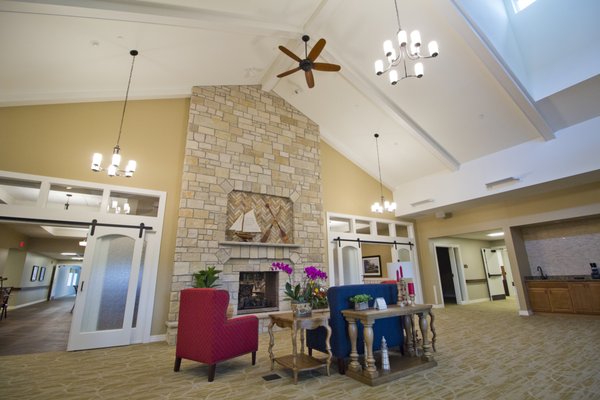 Our welcome area features a beautiful double-sided gas fireplace.