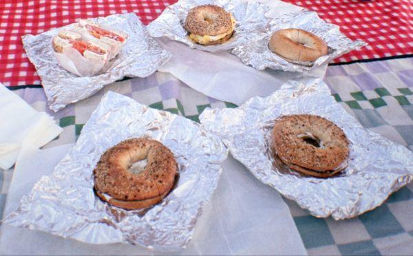 Everything Bagel with Garlic and Herb CC, Everything Bagel with CC, and Meat, Egg and Cheese on plain bagel.