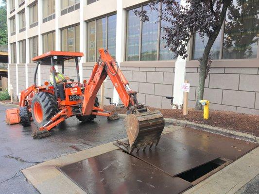 Removing metal plate to access Water Meter for Yearly Test