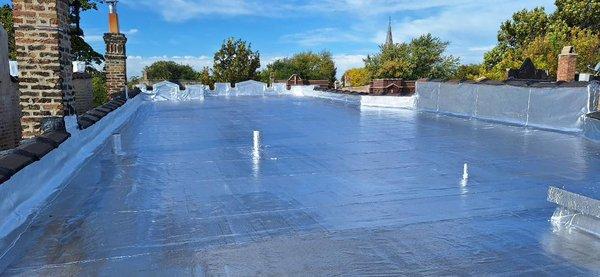 Modified roofing system with a fresh coat of aluminum coating