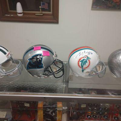 Autographed full size helmets Dolphins and Jets are replica Steelers is a Custom and Carolina is authentic.....