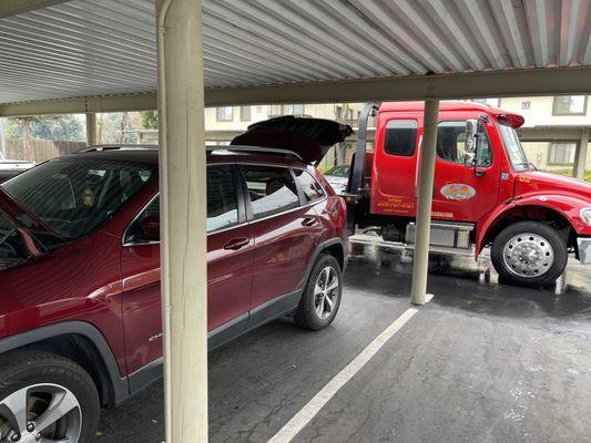 Tow truck and my vehicle.