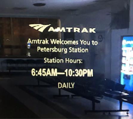 Door signage with operating hours