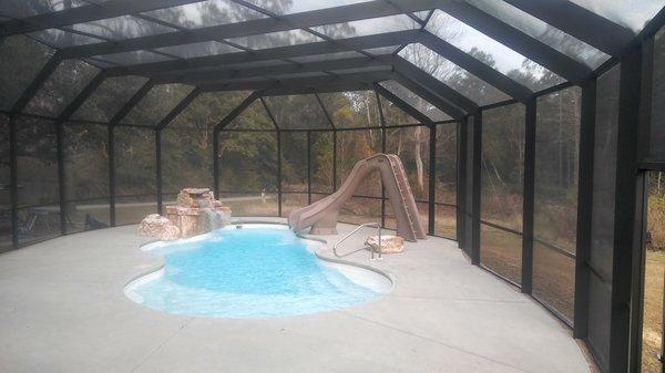 Custom aluminum pool enclosure built by Bayou Aluminum Enclosures