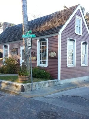 Cutest little red historic building!  Houses Southern Lights Candle Shop and Jennifer Roche Tiles