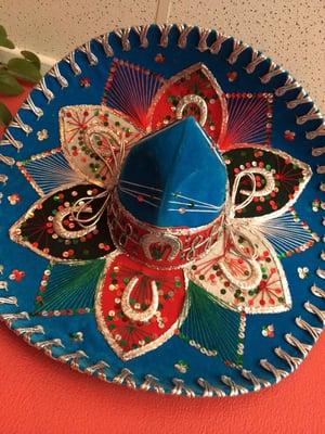 Cool little sombrero as part of their decoration.