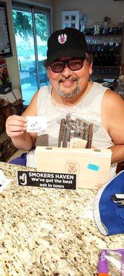 With my Micallef Cigars hat and all my cigars from their promotion. Thank you!!