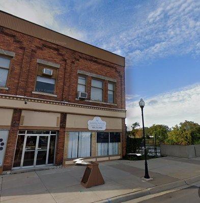 Front of building on N. 2nd Ave. Salon in the back.