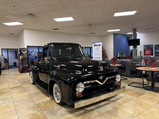 A picture of a classic Ford F-100 pickup truck in our Helena Toyota showroom!