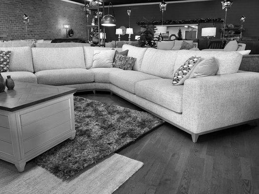 Sleek and stylish this modern sectional is sure to be the center of attention in any room.