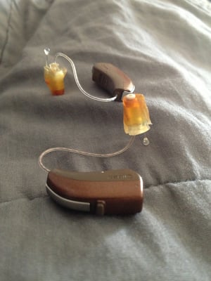 The sides of my hearing aids. - aka: my ears.