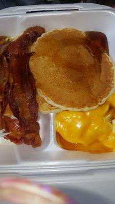 Pancake breakfast w/cheese eggs &  bacon. Excellent service. Clean environment. Reasonable prices. Great consistent food!!!