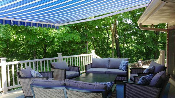 Adding a retractable awning can turn you hot deck into a backyard oasis!