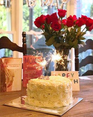 8 inch round cake, covered with rosettes in butter cream.  Absolutely delicious--even the icing which my family never likes.