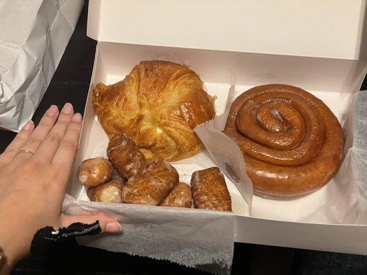 Croissant Ham Egg and Cheese, Cinnamon Roll, Half Dozen Glazed Cronuts