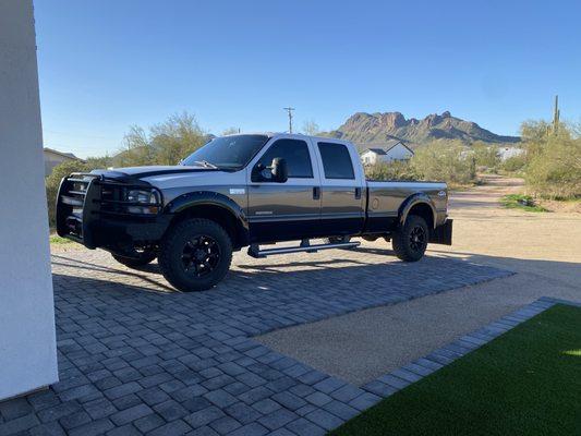 My 2002 Ford F 350 my driver side and passenger side door glass was replaced and full tint added by AGD.