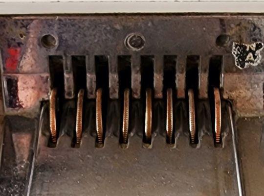 $2.00-Coin operated wash machines.