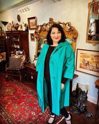 Lisa Marie loving her  vintage silk rain coat