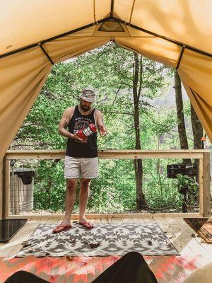 Happy camper in our Ozark tent. This one is perfect with a queen size memory foam mattress and fabulous view