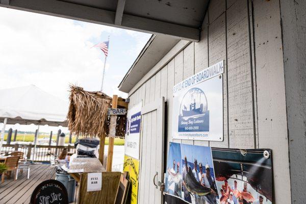 Our sign at the Marina's Ship Store. Grab a drink at the tike bar or an ice cream in the store after the tour.