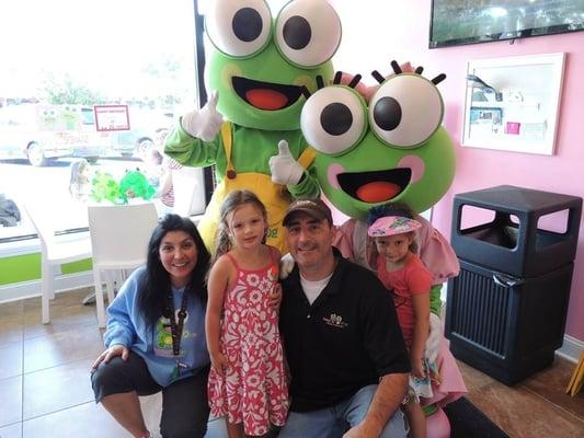 Owners Jennifer and Jimmy with Scoop, Cookie and a loyal customer.