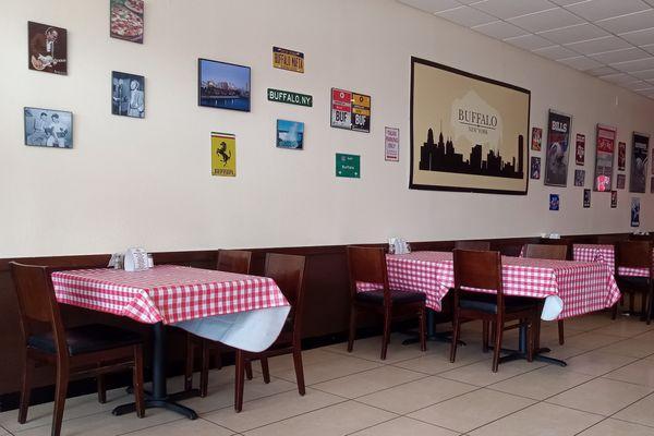 Pretty open dining area with about a dozen tables.