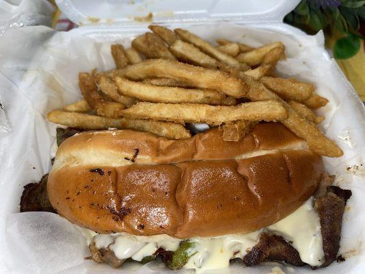 Philly Steak sandwich and fries